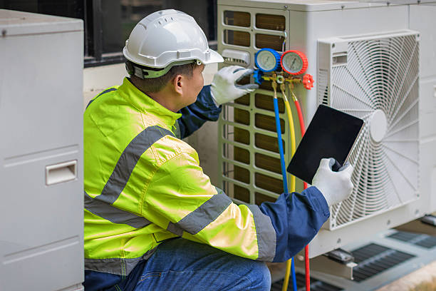Professional Heat Pump Repair technician working in Enfield, CT